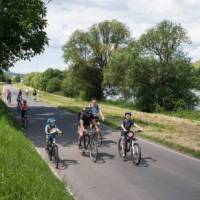 Family cycling along the Moselle Bike Path in Germany