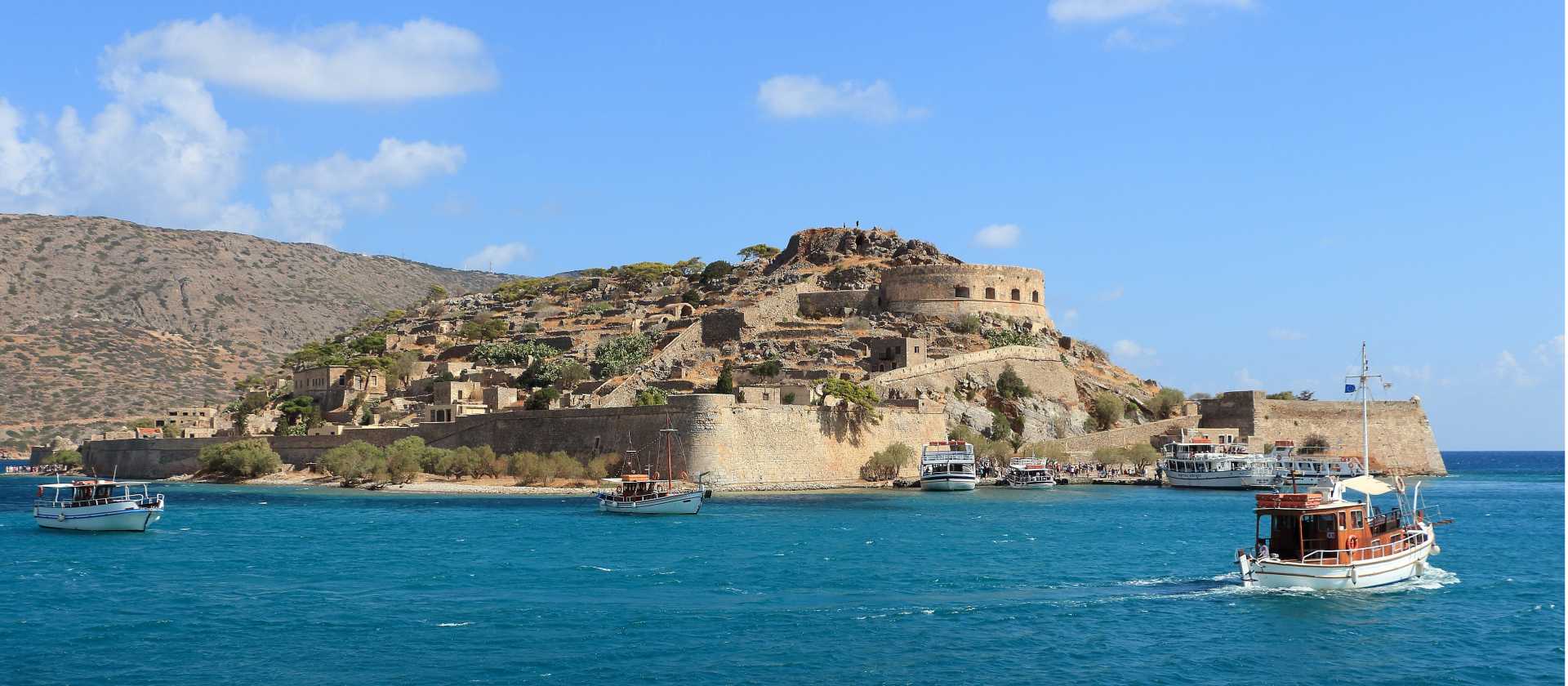 The stunning coastline of Crete Island features fine sandy beaches and tranquil blue water
