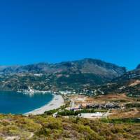 The stunning coastline of Crete Island features fine sandy beaches and tranquil blue water