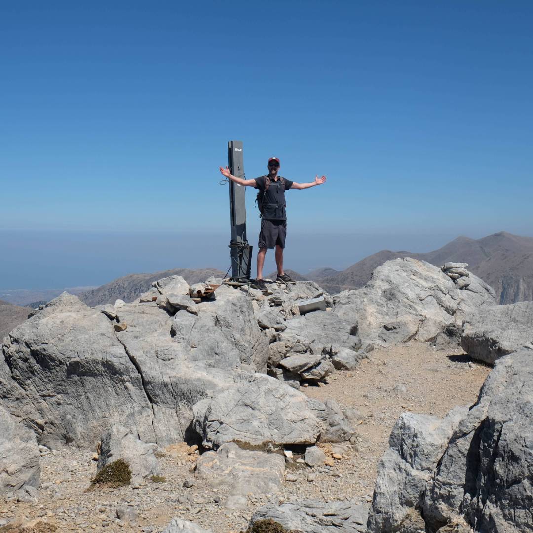 Hiker on the summit of Mt Gingilos, Crete | Jaclyn Lofts