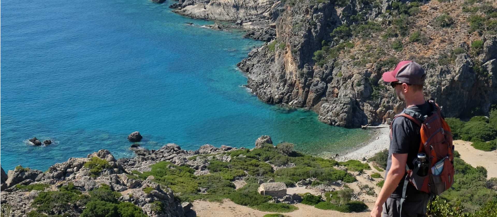 Hiker descending to Lissos Beach in Crete | Jaclyn Lofts