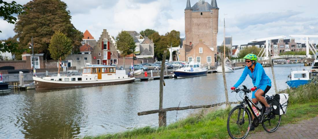 Cycling along the canal in Zierikzee in the province of Zeeland