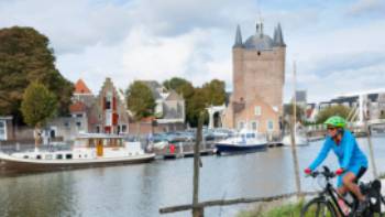 Cycling along the canal in Zierikzee in the province of Zeeland