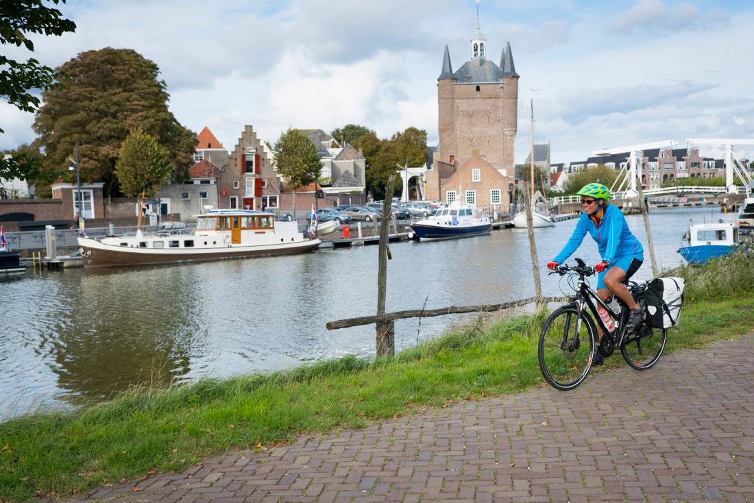 Cycling along the canal in Zierikzee in the province of Zeeland
