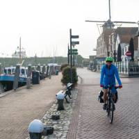 Cycling by the canal in Willemstad