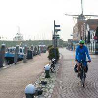 Cycling by the canal in Willemstad