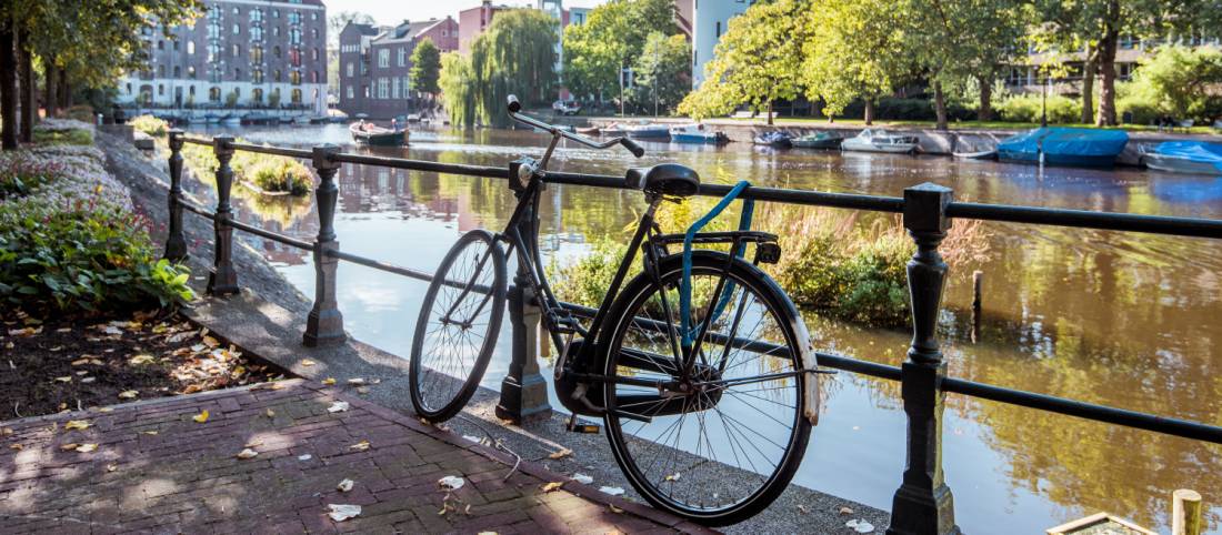 Park your bike alongside a Dutch canal in Amsterdam |  <i>Koen Smilde</i>