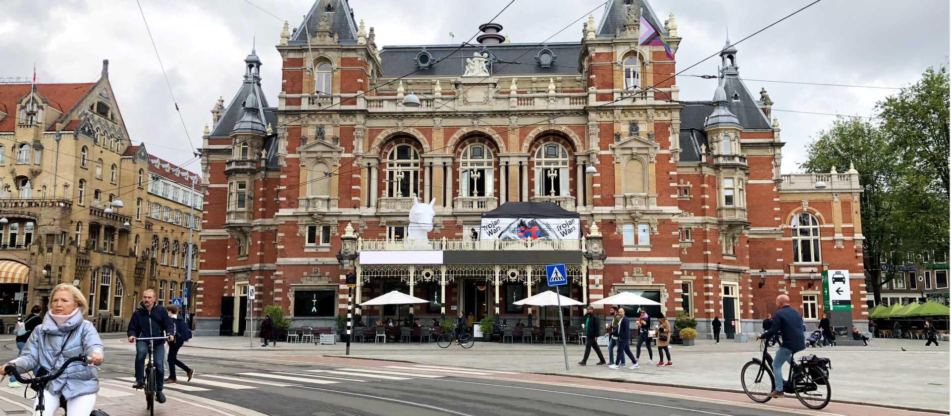 Cycling by the International Theatre in Amsterdam | Mariah Zade
