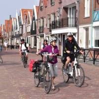 Cyclists on the dyke in Volendam