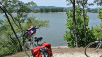 Beautiful Danube and our trusty bikes,Lilly Donkers Bikes resting beside the Danube, Hungary