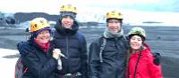 Family with teens walking on a glacier in Iceland | Kate Baker