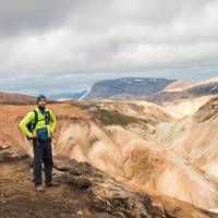 A hiker on the impossibly scenic Laugavegur Trail in Iceland