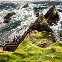 Walking to the edge of the spectacular Dingle Peninsula in Ireland. | Christian Birkholz