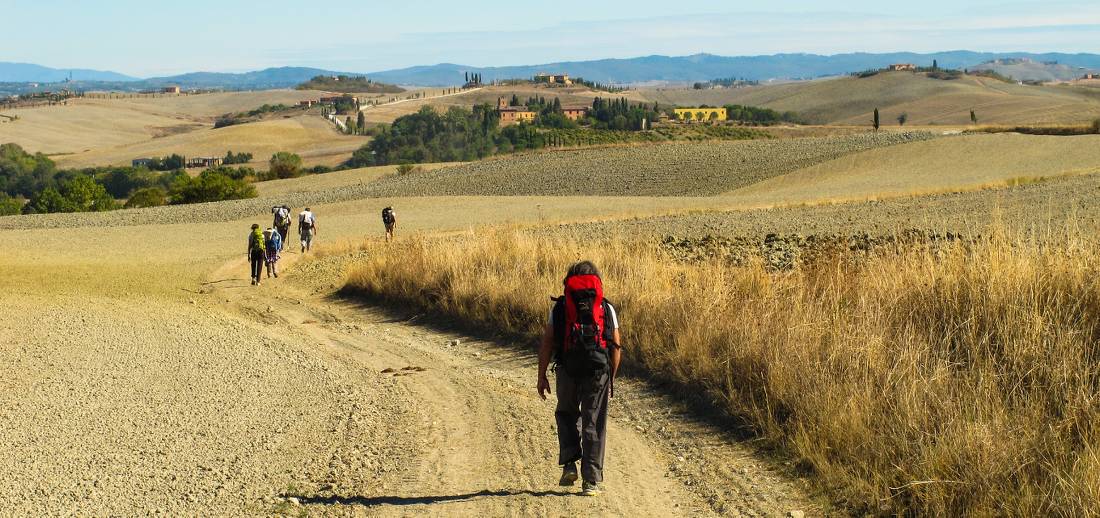 Pilgrims making their way towards Rome on the Via Francigena