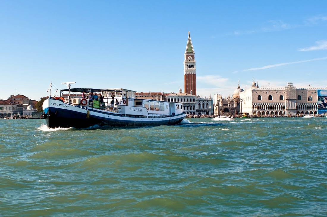 Barge departing Venice on our Veneto by Bike and Boat trip