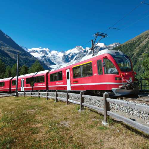 The scenic Bernina Express train travels from Tirano to Switzerland