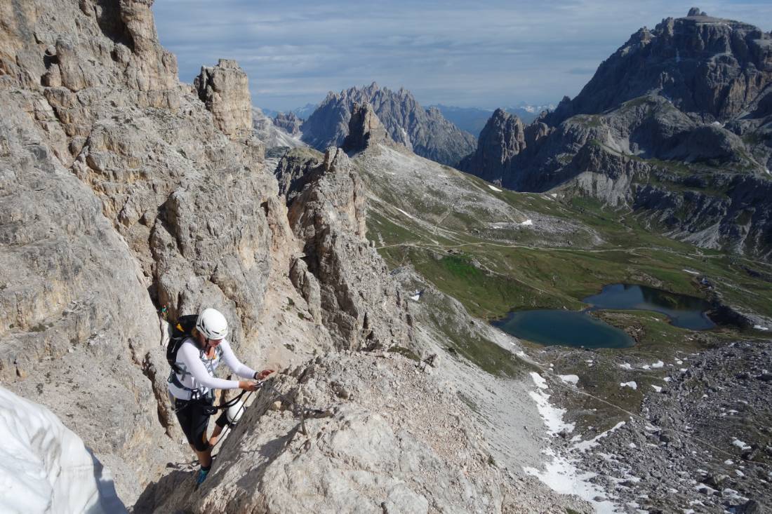 Climber making her way up the Via Ferrata in the Dolomites