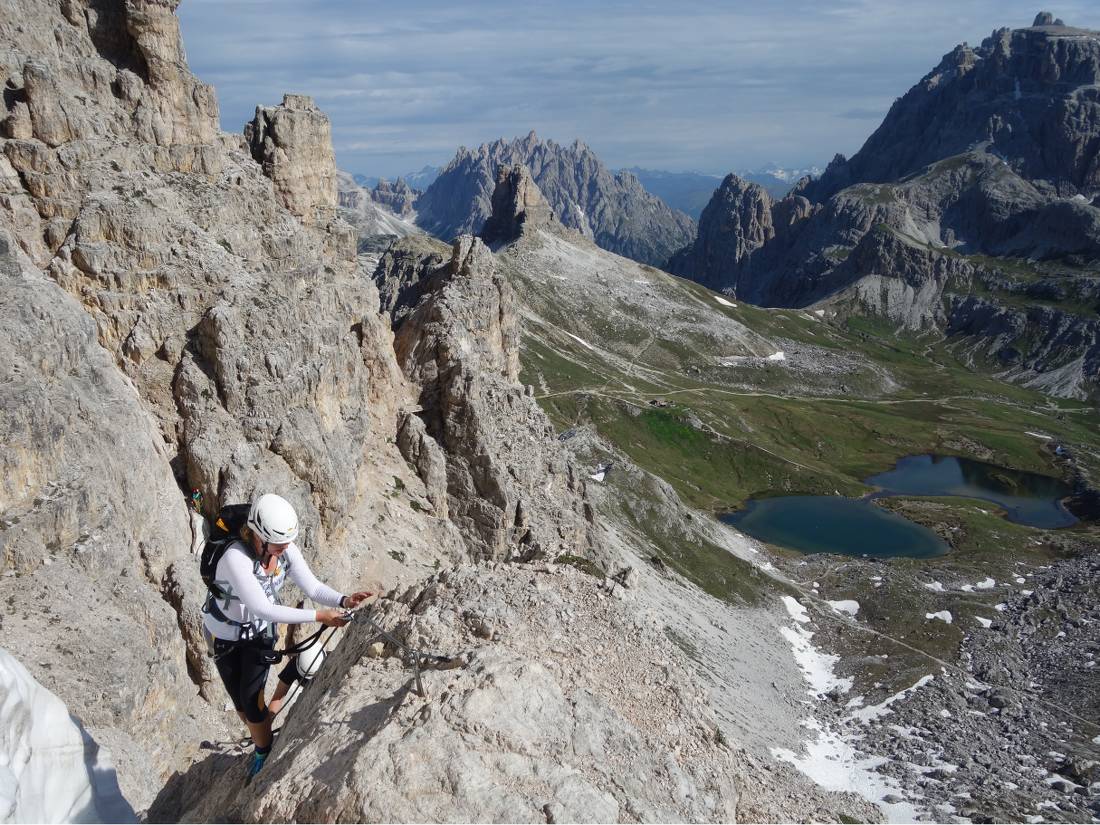 Climber making her way up the Via Ferrata in the Dolomites