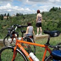 Cyclists taking in the Tuscan view