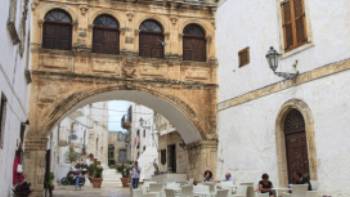 Espresso break outside The Bishop's Palace,Lesley Treloar The old town citadel , Ostuni, Puglia, Italy.