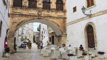 Espresso break outside The Bishop's Palace,Lesley Treloar The old town citadel , Ostuni, Puglia, Italy.