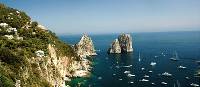 View of the Faraglioni rocks on the coastline of Capri, Italy | Sue Badyari