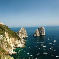 View of the Faraglioni rocks on the coastline of Capri, Italy | Sue Badyari