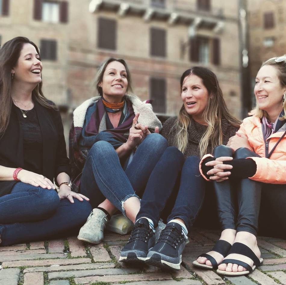 Walkers taking pleasure in the Piazza del Campo in Siena |  <i>Allie Peden</i>