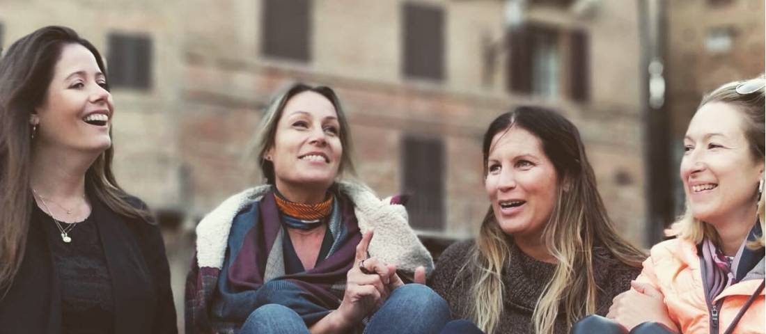 Walkers taking pleasure in the Piazza del Campo in Siena | <i>Allie Peden</i>
