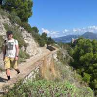 Hker on a trail above the sea in Capri | Kate Baker