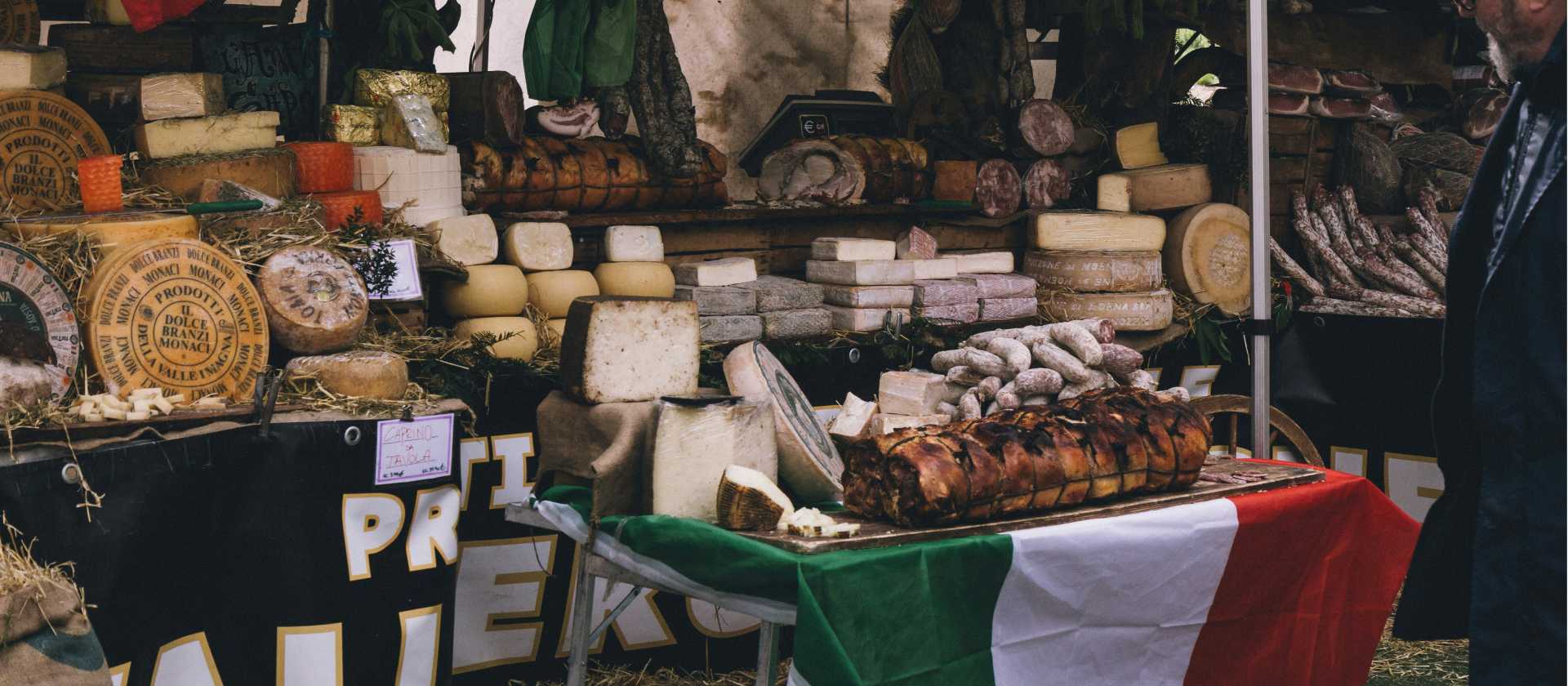 A feast for the senses artisan cheeses, cured meats, and generations of Italian culinary tradition on display. | Kristijan Arsov