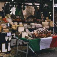 A feast for the senses artisan cheeses, cured meats, and generations of Italian culinary tradition on display. | Kristijan Arsov