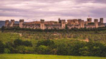 Montereggioni from distance,Tim Charody The walled town of Monteriggioni sits dramatically in the Tuscan landscape