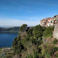 Surrounded by lush woodland, Lake Nemi is a serene volcanic crater lake steeped in mythology and Roman history
