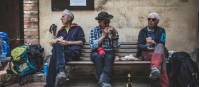 Pilgrims eating lunch on the Via Francigena | <i>Tim Charody</i>