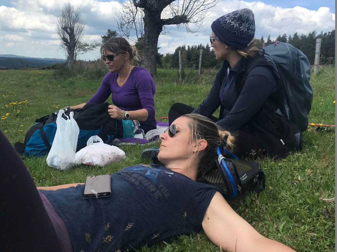 Rest stop in a lush field in Tuscany while walking the Via Francigena |  <i>Allie Peden</i>