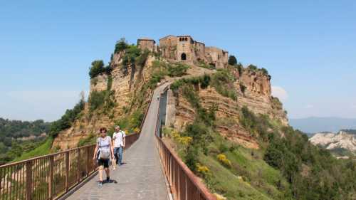 Hikers returning from the town of Civita di Bagnoregio