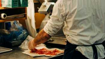 Where Parma's culinary heritage comes to life, one slice at a time.