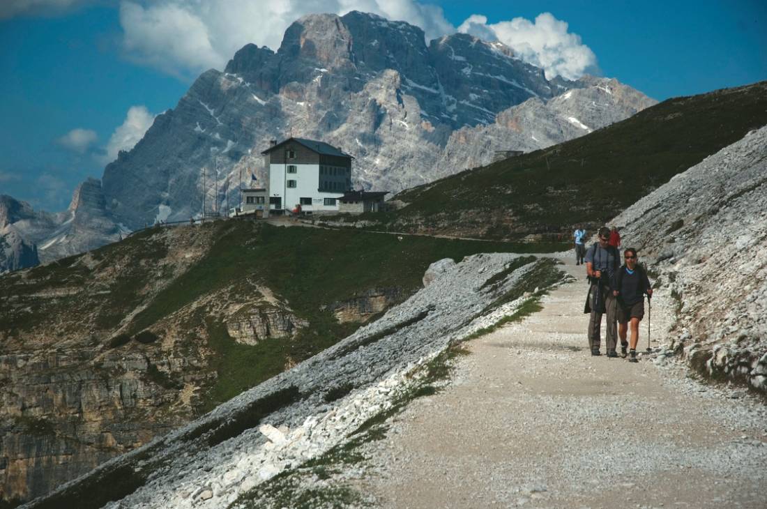 Hiker walking in the Dolomites, Italy | <i>Kate Baker</i>