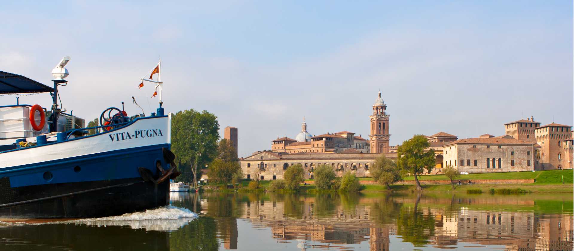 Travel past authentic Italian villages by bike or boat in the Veneto region