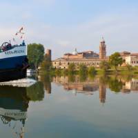 Travel past authentic Italian villages by bike or boat in the Veneto region
