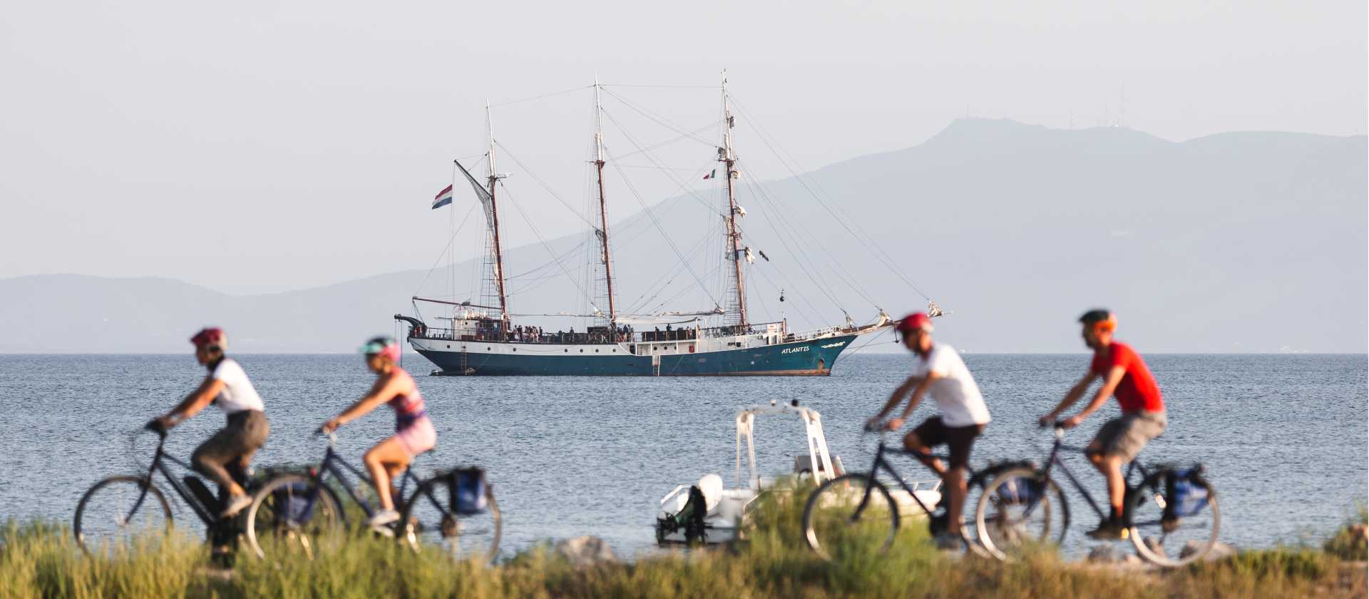 Cycling past the sailboat in Tuscany