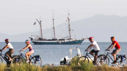 Cycling past the sailboat in Tuscany
