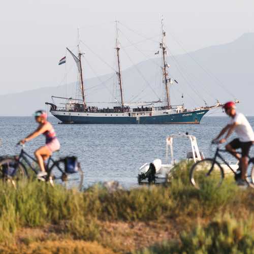 Cycling past the sailboat in Tuscany