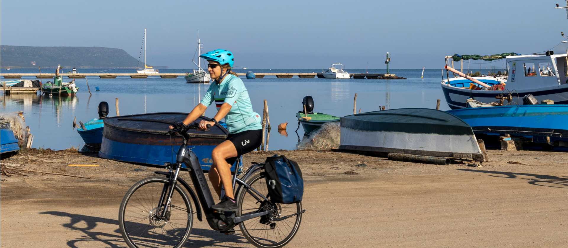 Cycling past fishing boats
