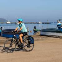 Cycling past fishing boats