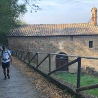 hikers on the ramparts of Montalcino in Tuscany | Kate Baker