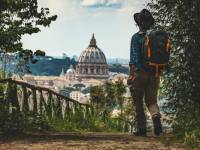 Pilgrim walking into St Peters in Rome at the end of the Via Francigena |  <i>Tim Charody</i>