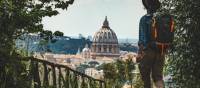 Pilgrim walking into St Peters in Rome at the end of the Via Francigena | Tim Charody