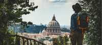 Pilgrim walking into St Peters in Rome at the end of the Via Francigena | Tim Charody